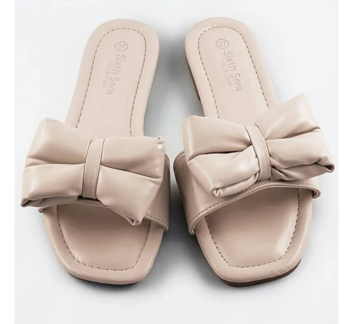 Béžové dámské pantofle s mašlí model 17360278 Béžové dámské pantofle s mašlí model 17360278