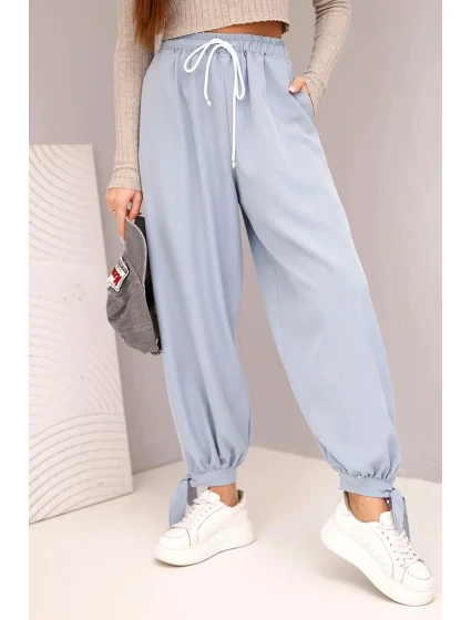 Dámske nohavice so širokými nohavicami a viazaním v spodnej časti džínsovo modré