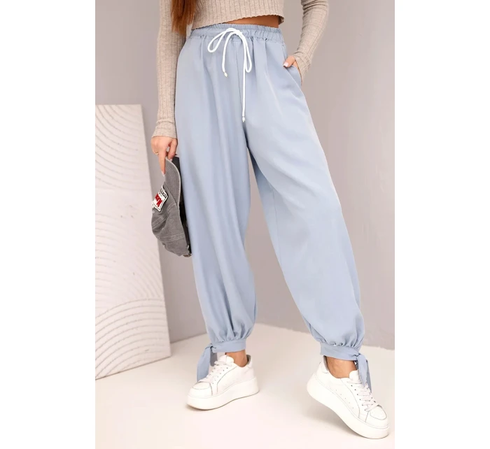 Dámske nohavice so širokými nohavicami a viazaním v spodnej časti džínsovo modré