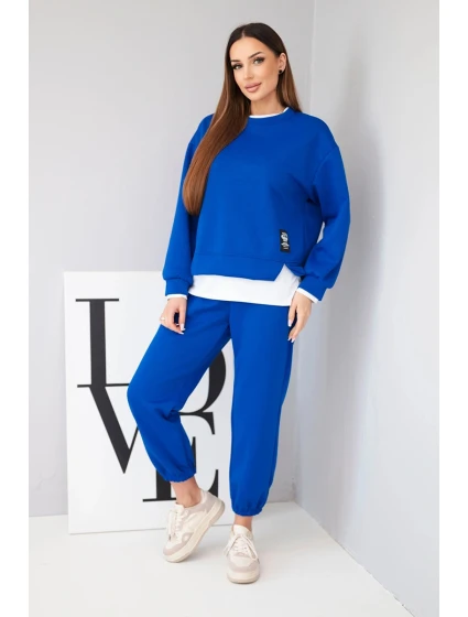 Dámský komplet s s volnou mikinou a tepláky modrý model 21808627 - K-Fashion Dámský komplet s s volnou mikinou a tepláky modrý model 21808627 - K-Fashion