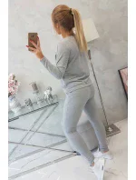 Súprava s gombíkovým výstrihom šedej farby Súprava s gombíkovým výstrihom šedej farby