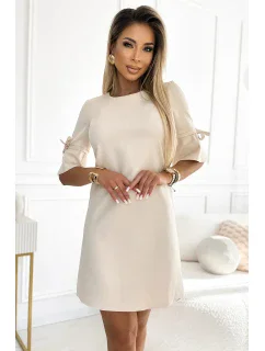 217-10 NEVA Trapézové šaty s rozšírenými rukávmi - béžové s trblietkami