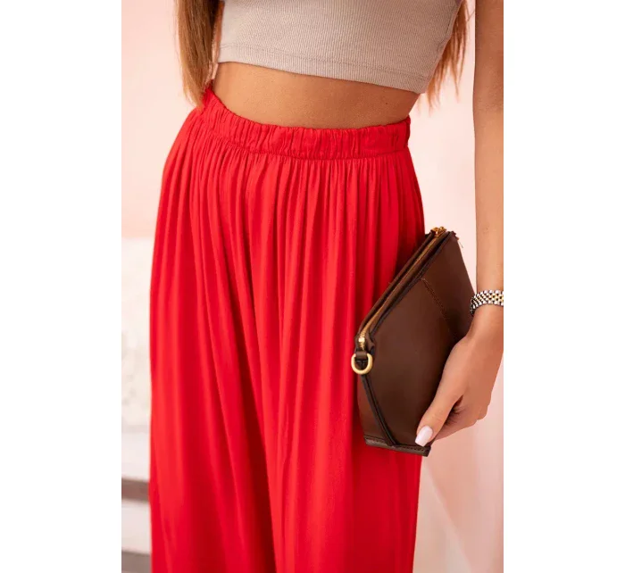 Dámske široké viskózové nohavice s elastickým pásom červené Dámske široké viskózové nohavice s elastickým pásom červené