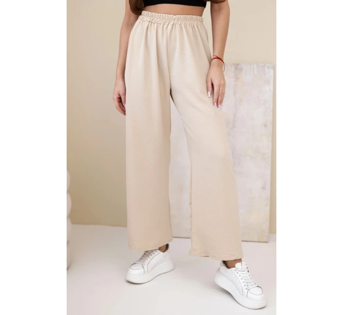Široké nohavice tmavobéžovej farby