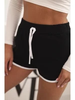 Dámské bavlněné šortky s elastickým pasem a model 21772746 lemem černé - K-Fashion Dámské bavlněné šortky s elastickým pasem a model 21772746 lemem černé - K-Fashion
