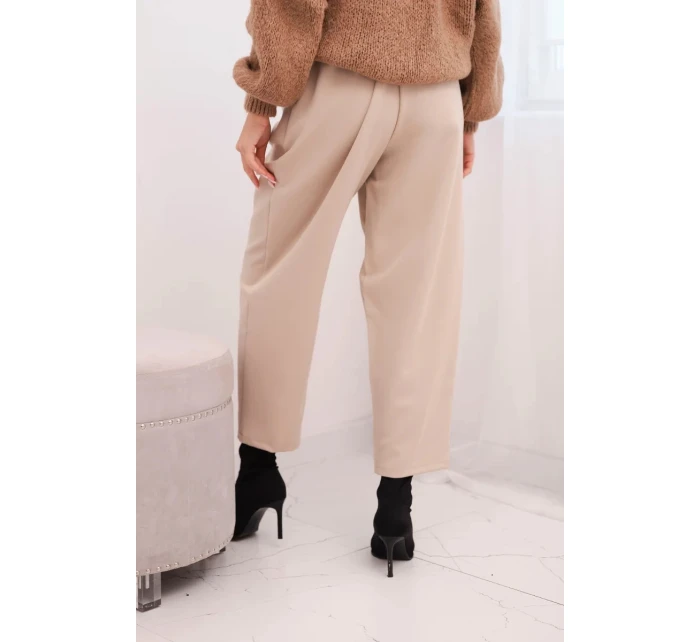 Dámské kalhoty s vysokým pasem a záhyby béžové