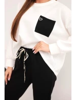 Dámska maslová súprava s kontrastným vreckom čierna Dámska maslová súprava s kontrastným vreckom čierna