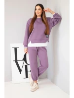 Dámský komplet s s volnou mikinou a tepláky fialový model 21808629 - K-Fashion Dámský komplet s s volnou mikinou a tepláky fialový model 21808629 - K-Fashion