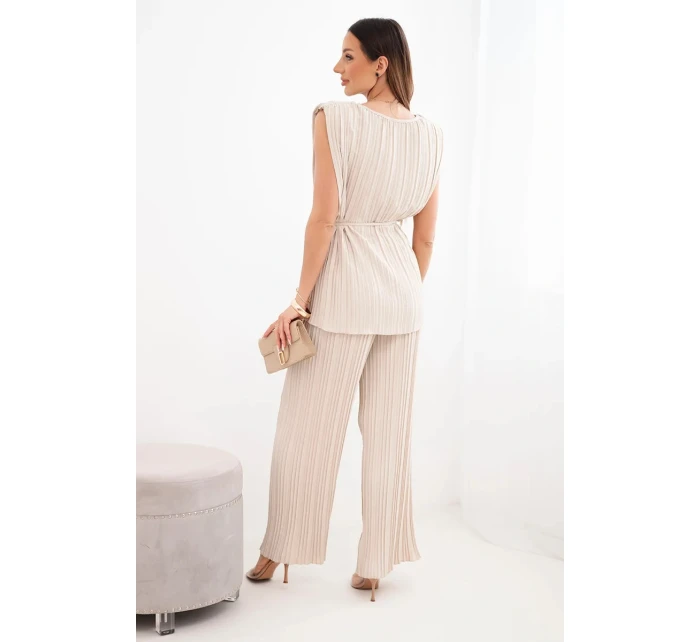 Dámsky viskózový plisovaný komplet s viazanou blúzkou a širokými nohavicami béžovej farby