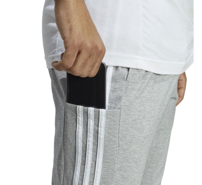 Nohavice adidas Essentials Single Jersey Tapered Open Hem 3-Stripes M IC0046