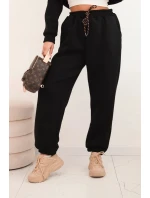 Dámský teplákový komplet model 21441644 z bavlny s kapucí černý - K-Fashion Dámský teplákový komplet model 21441644 z bavlny s kapucí černý - K-Fashion