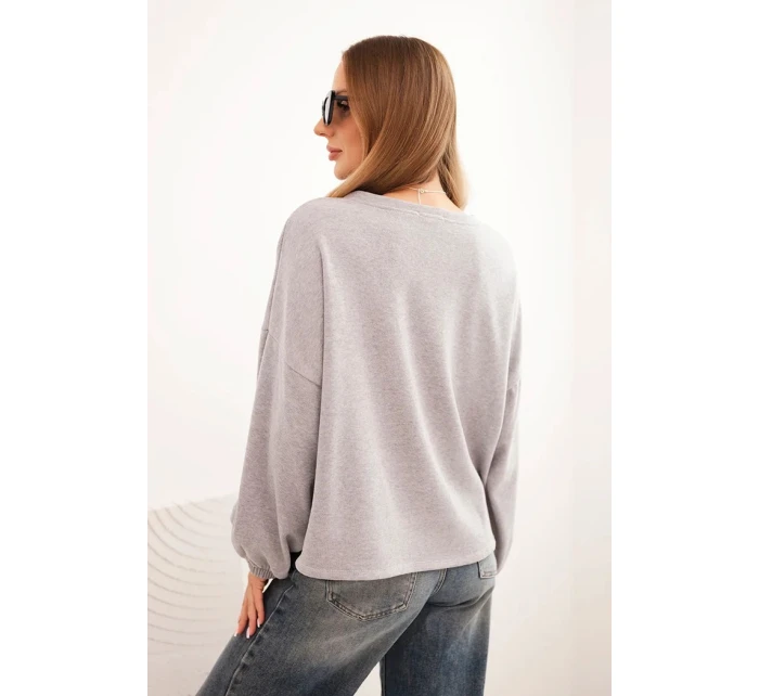 Dámska mikina s ozdobným lemom v spodnej časti sivá Dámska mikina s ozdobným lemom v spodnej časti sivá