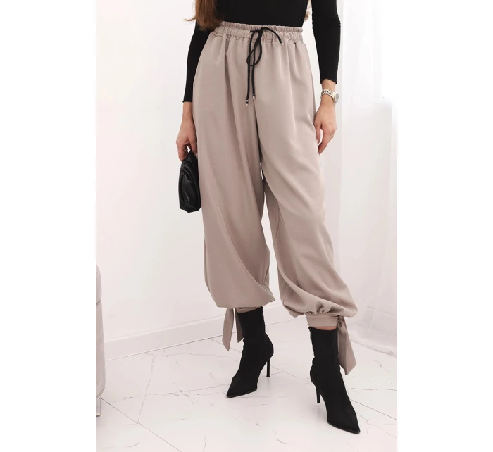 Dámske nohavice so širokými nohavicami a spodným viazaním fango Dámske nohavice so širokými nohavicami a spodným viazaním fango