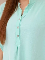 Blúzka s predĺženým chrbtom mätou