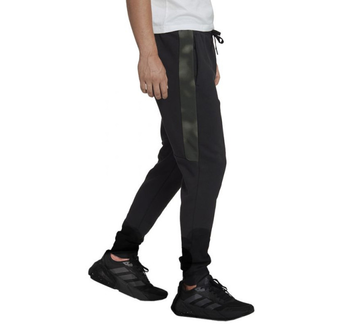 Fleecové nohavice adidas Essentials Camo Print M HL6929