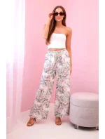 Dámské široké kalhoty s květinovým potiskem tmavá máta Dámské široké kalhoty s květinovým potiskem tmavá máta