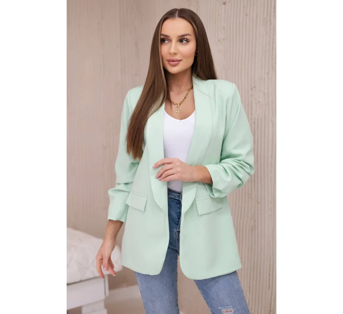 Bunda s klopou elegantná svetlá mentolová Bunda s klopou elegantná svetlá mentolová