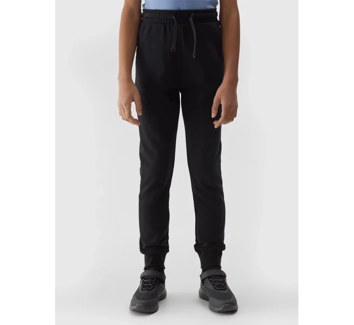 Dívčí tepláky typu jogger 4F - černé Dívčí tepláky typu jogger 4F - černé