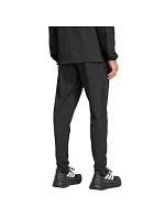 Pánské kalhoty Tiro 26 Travel Woven černé model 22062461 - ADIDAS