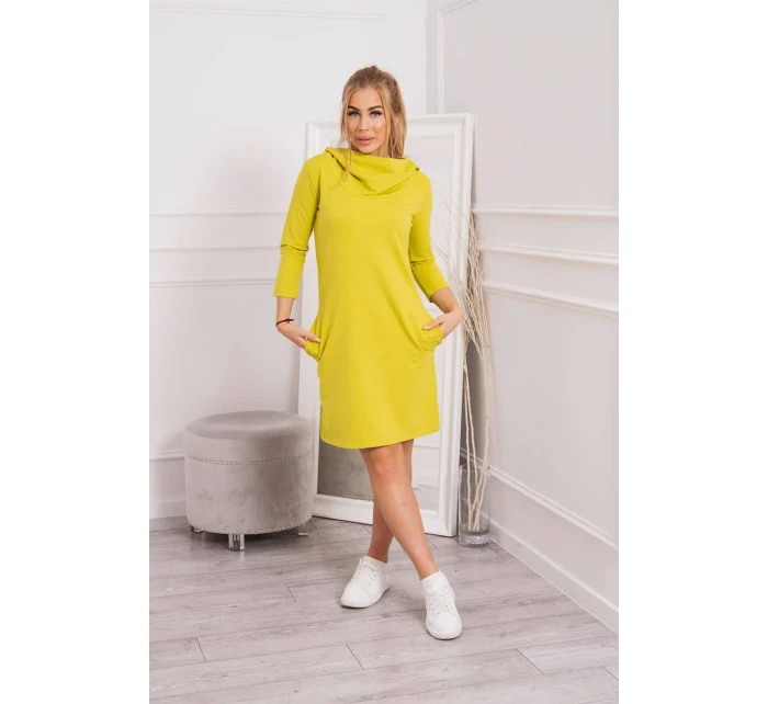 Šaty s kapucí a kapsami na kiwi Šaty s kapucí a kapsami na kiwi