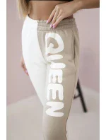 Dámske tepláky s nápisom QUEEN béžové