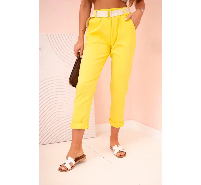 Dámske viskózové nohavice s opaskom a rozšírenými nohavicami tmavo žlté Dámske viskózové nohavice s opaskom a rozšírenými nohavicami tmavo žlté