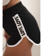 Dámské bavlněné šortky s elastickým pasem a model 21772746 lemem černé - K-Fashion Dámské bavlněné šortky s elastickým pasem a model 21772746 lemem černé - K-Fashion