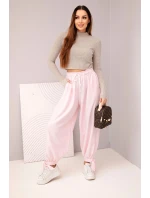 Dámske nohavice so širokými nohavicami a viazaním v spodnej časti candy pink