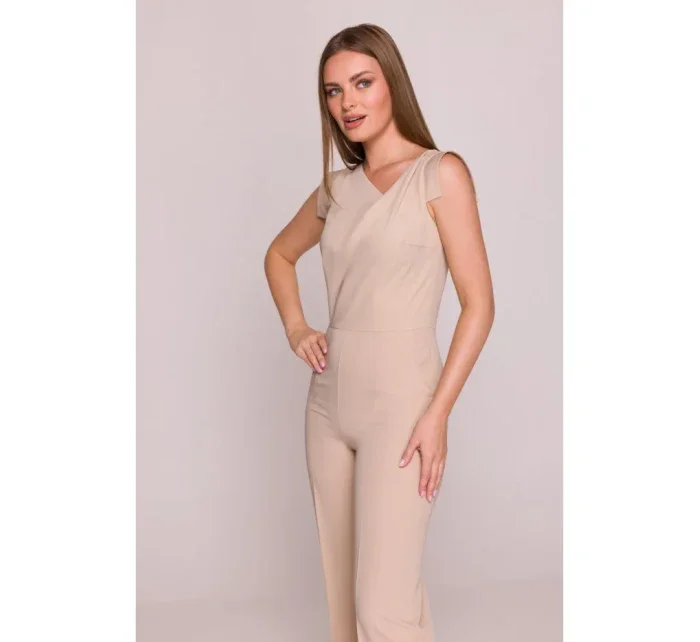 S407 Elegantný overal s asymetrickým výstrihom - béžový