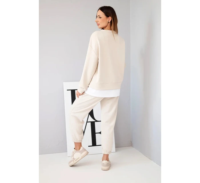 Dámska súprava s maslovou mikinou a voľnými teplákmi béžová Dámska súprava s maslovou mikinou a voľnými teplákmi béžová