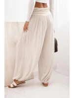 Dámské viskózové kalhoty s širokými nohavicemi a volánky béžový