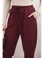 Elegantné nohavice s vysokým pásom a viazaním v páse vo vínovej farbe Elegantné nohavice s vysokým pásom a viazaním v páse vo vínovej farbe