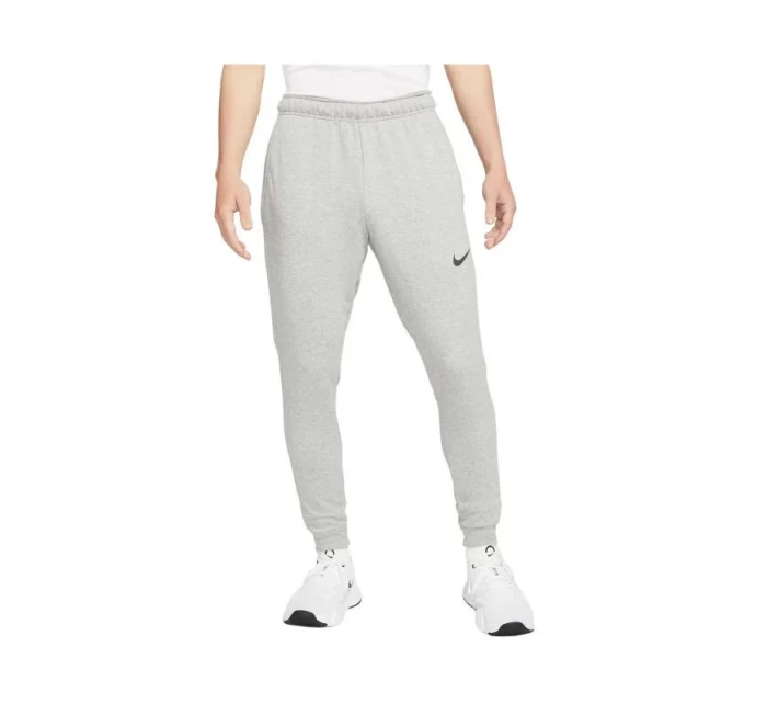 Pánske tréningové nohavice Dri-Fit Trapered M CZ6379-063 sivé - Nike Pánske tréningové nohavice Dri-Fit Trapered M CZ6379-063 sivé - Nike