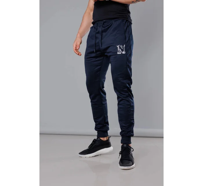 Tmavě modré pánské teplákové kalhoty s potiskem model 18347905 - J.STYLE Tmavě modré pánské teplákové kalhoty s potiskem model 18347905 - J.STYLE