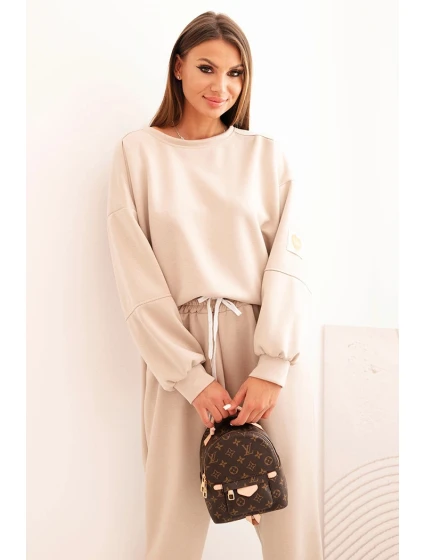Dámska maslová súprava s voľnou mikinou a nohavicami LOVE beige Dámska maslová súprava s voľnou mikinou a nohavicami LOVE beige