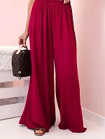 Dámske viskózové nohavice so širokými nohavicami a elastickým pásom tmavo vínovej farby
