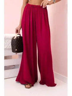 Široké dámské kalhoty s elastickým pasem tmavě vínová