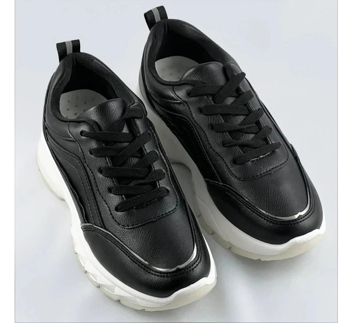 Černé dámské sneakersy s lemovkou model 17139088 Černé dámské sneakersy s lemovkou model 17139088