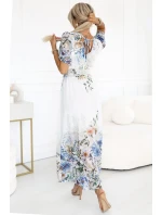 613-1 CELINA Vzdušné maxi šaty s obálkovým výstrihom, opaskom a kvetinovým ombre - MODRÁ 613-1 CELINA Vzdušné maxi šaty s obálkovým výstrihom, opaskom a kvetinovým ombre - MODRÁ