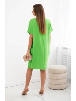 Šaty s vreckami a príveskom zelenej farby