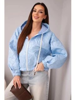 Dámska prešívaná bunda s kapucňou a ozdobnou kvetinovou potlačou modrá