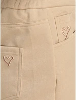 Spodnie damskie bawełniane dresowe beżowe model 22554603 - FashionStreet Spodnie damskie bawełniane dresowe beżowe model 22554603 - FashionStreet