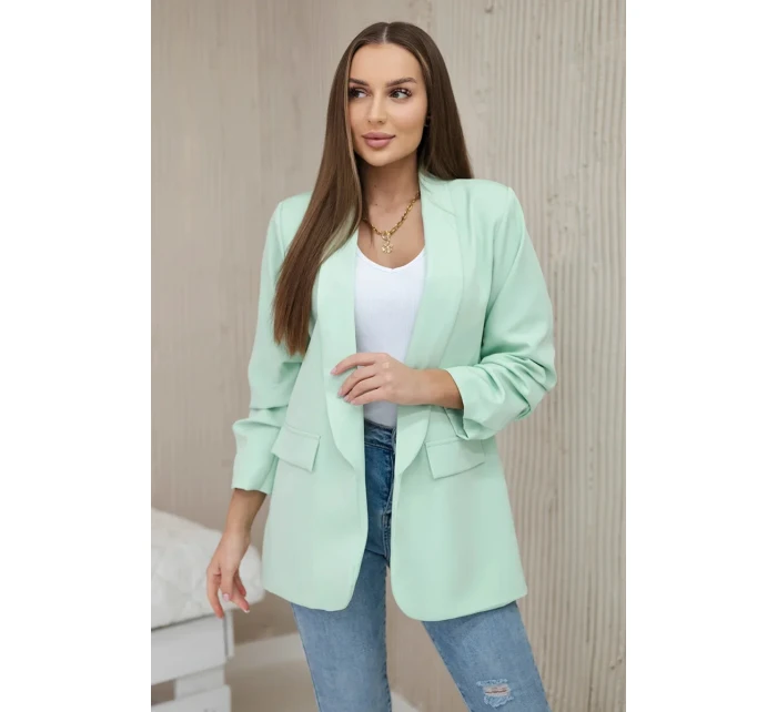 Bunda s klopou elegantná svetlá mentolová Bunda s klopou elegantná svetlá mentolová