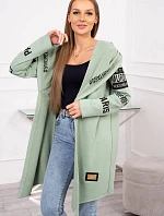 Pláštenka svetlomätovej farby s nápismi