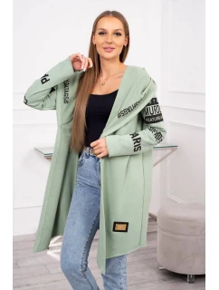 Pláštěnka světle mátové barvy s nápisy