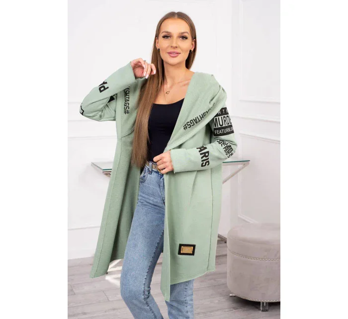 Pláštěnka světle mátové barvy s nápisy