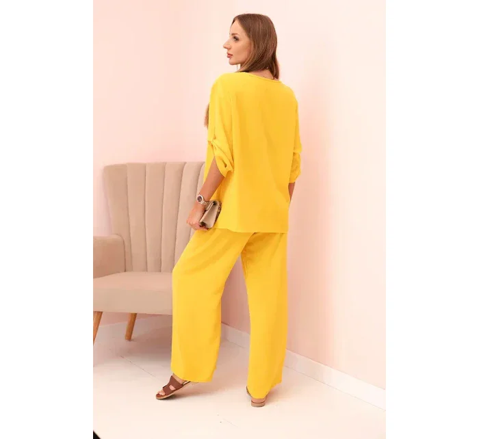 Dámska súprava s blúzkou s náhrdelníkom a širokými nohavicami žltá Dámska súprava s blúzkou s náhrdelníkom a širokými nohavicami žltá