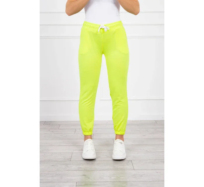 Bavlněné kalhoty žluté neonové