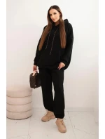 Dámský teplákový komplet model 21441644 z bavlny s kapucí černý - K-Fashion Dámský teplákový komplet model 21441644 z bavlny s kapucí černý - K-Fashion