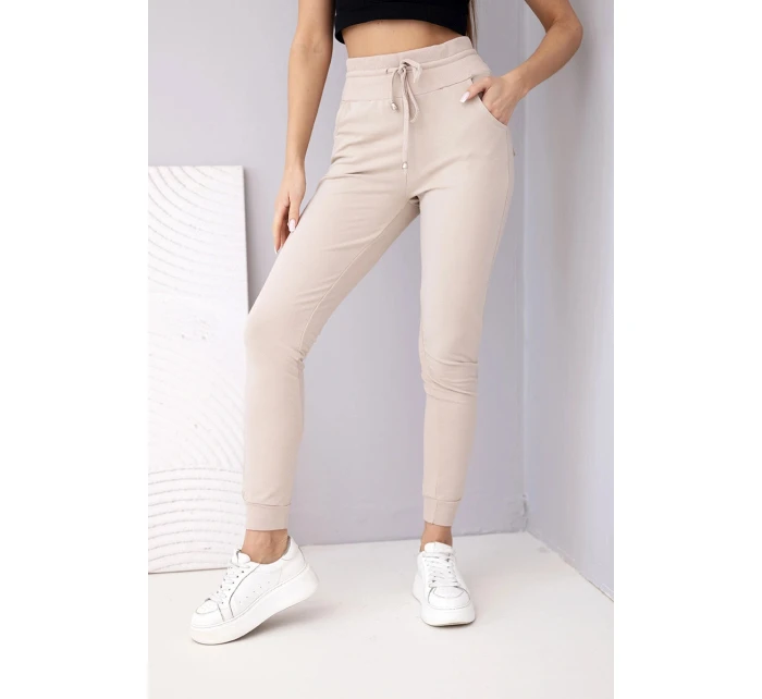 Dámské teplákové kalhoty s vysokým pasem a šňůrkou béžové